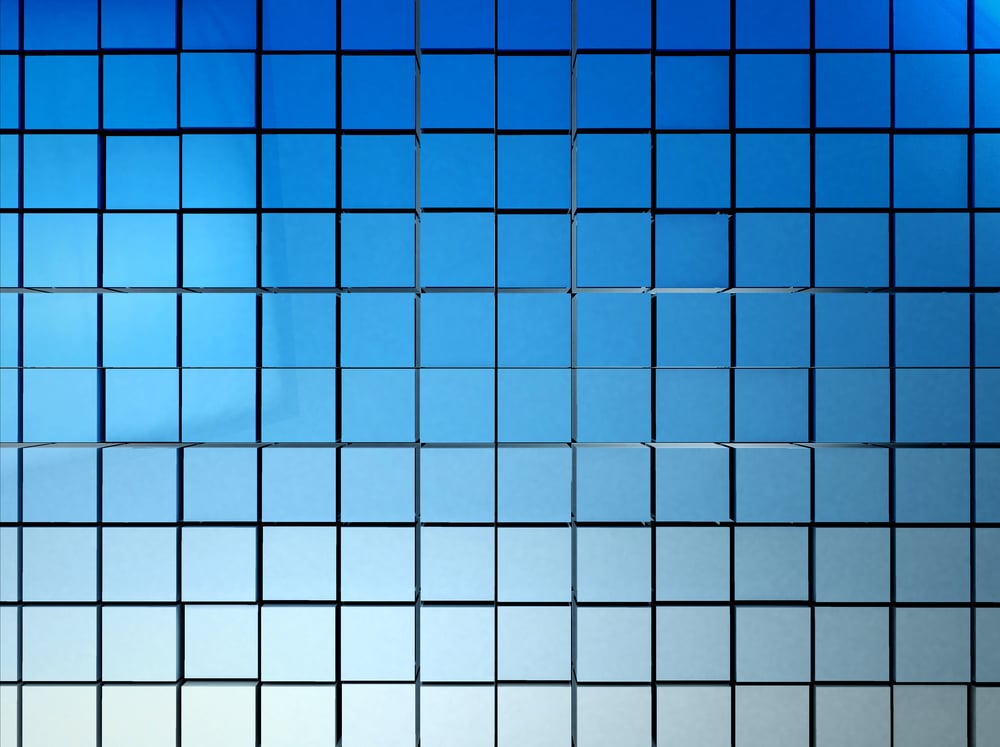 3D mosaic of blue squares grading into white Ã?Â¢?? to be used as background