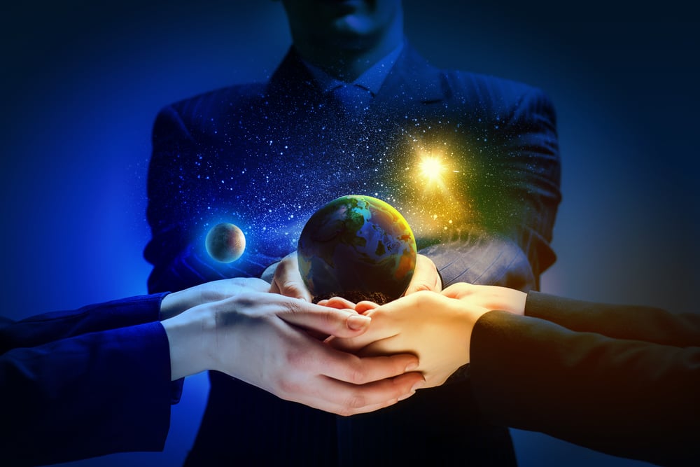 Close up image of human hands holding earth planer. Ecology concept