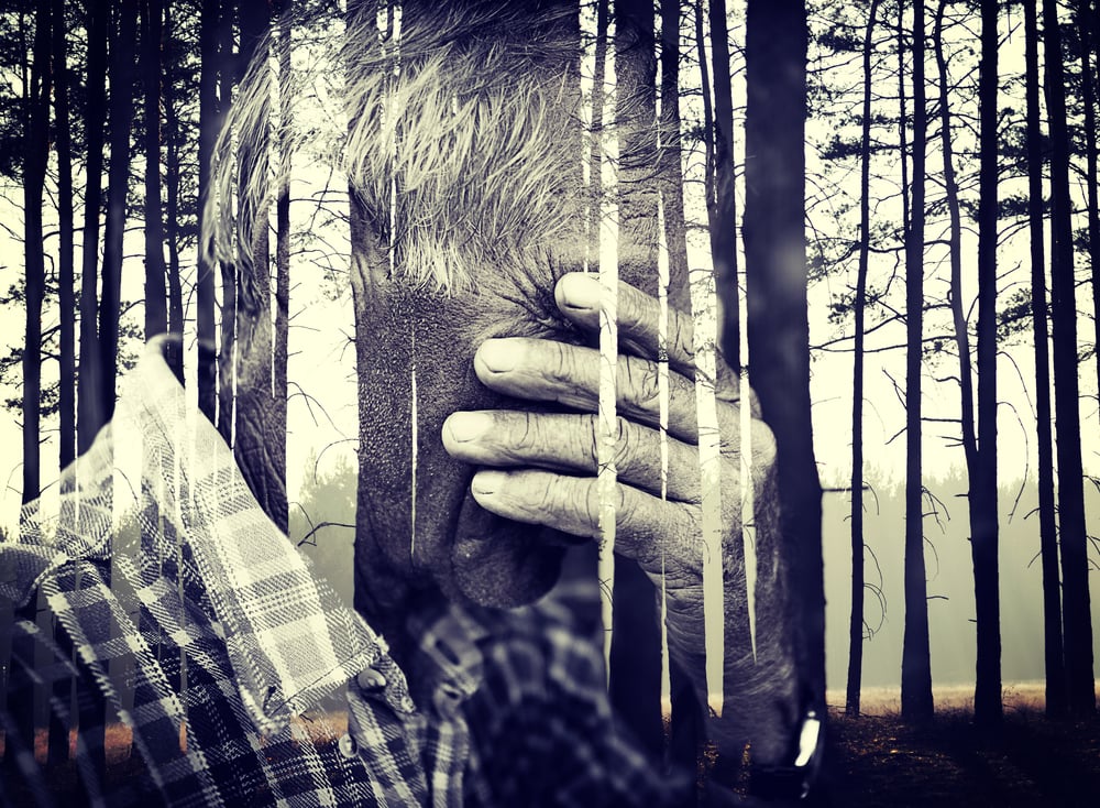 Double exposure of desperate senior man suffering and covering face with hands in deep depression, pain, emotional disorder, grief and desperation concept