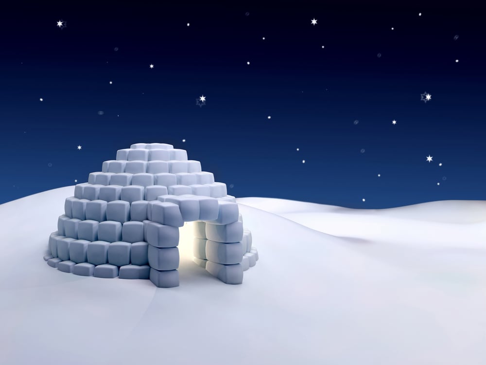 Igloo made with snow cubes at night