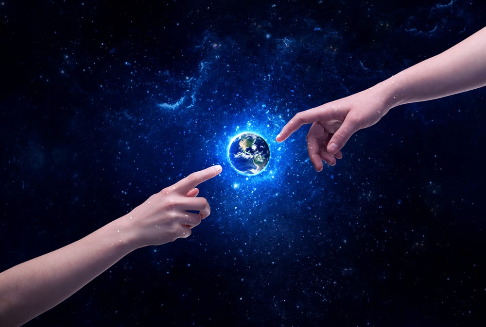 Male god hands about to touch the earth globe in the galaxy with bright shining stars and blue light illustration concept. Elements of this image furnished by NASA.