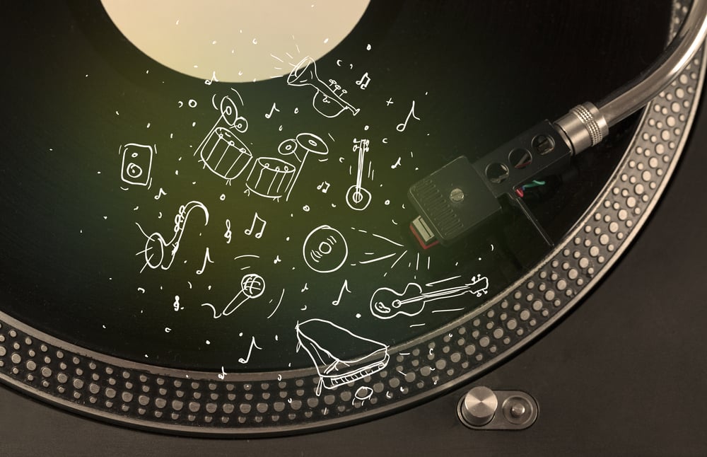 Turntable playing classical music with icon drawn instruments concept on background