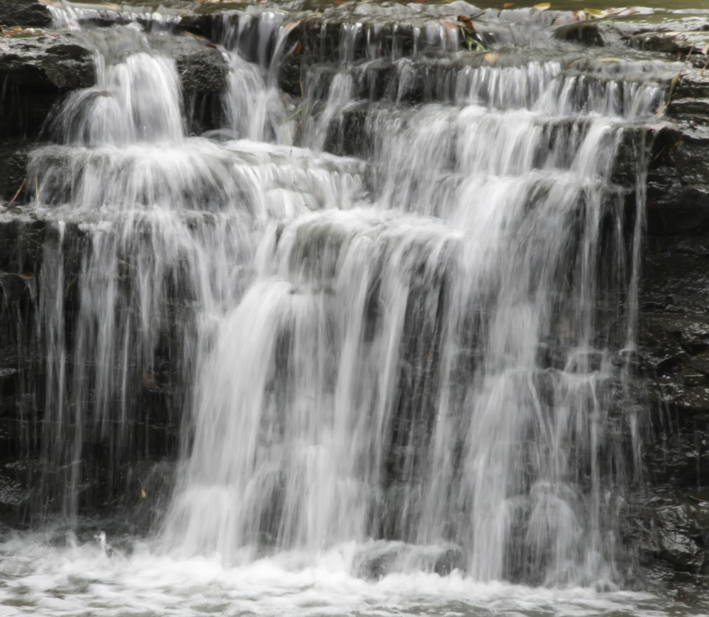 Waterfall over broken rock